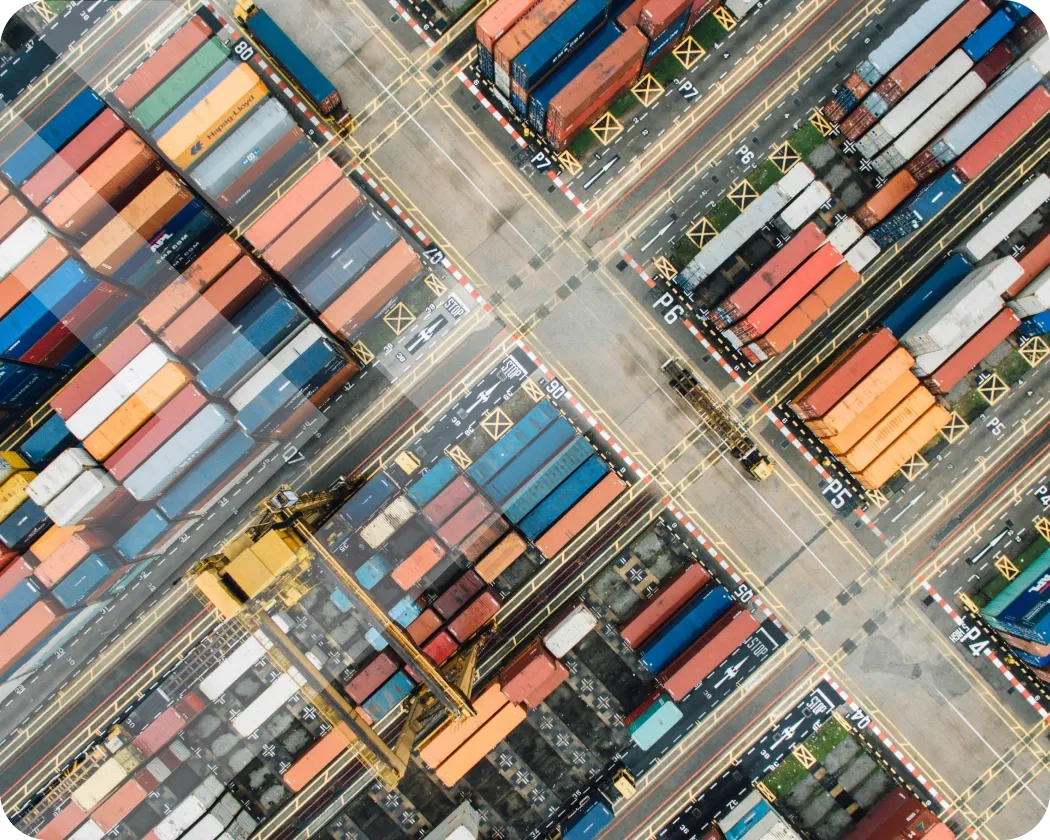An overhead view of a shipment container yard.